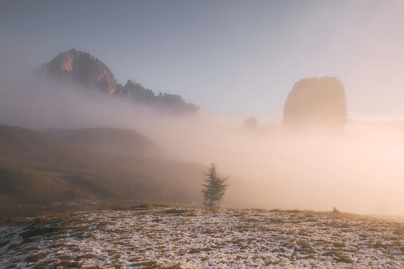 Morning mist surrounding the Cinque Torri rock formations near Rifugio Scoiattoli in the Dolomites