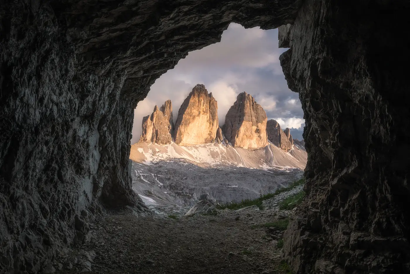 Tre Cime di Lavaredo viewed from a World War I tunnel in the Dolomites, Italy